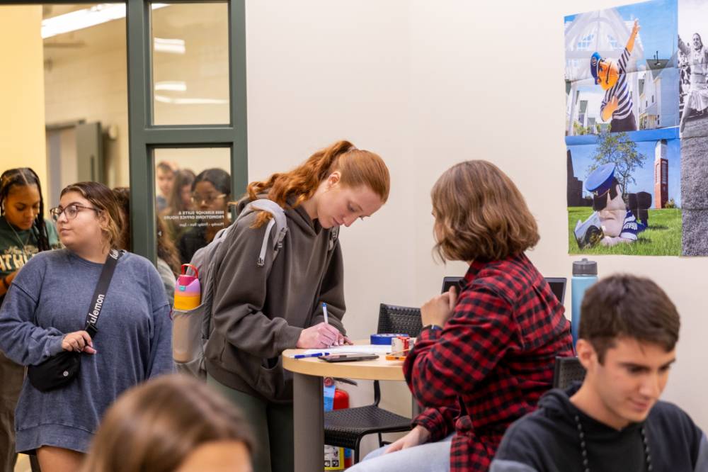 Students signing in for day of service